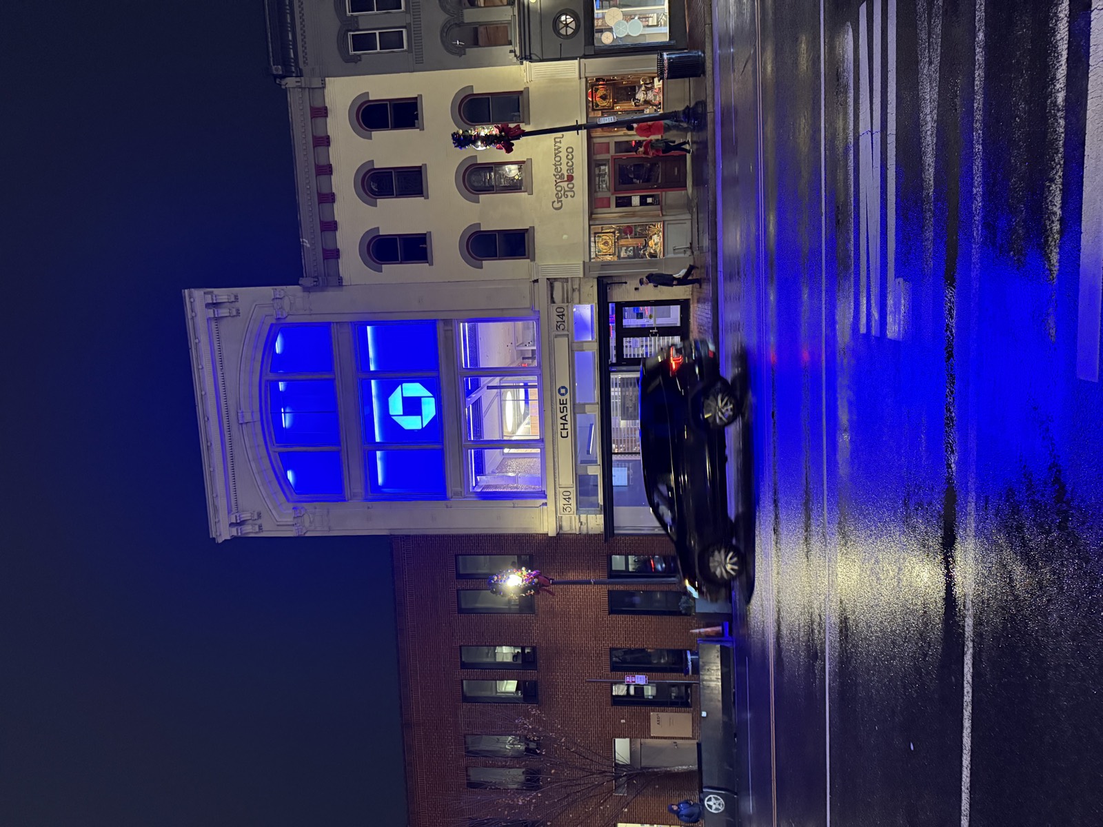 Chase bank illuminated channel letter signage at night