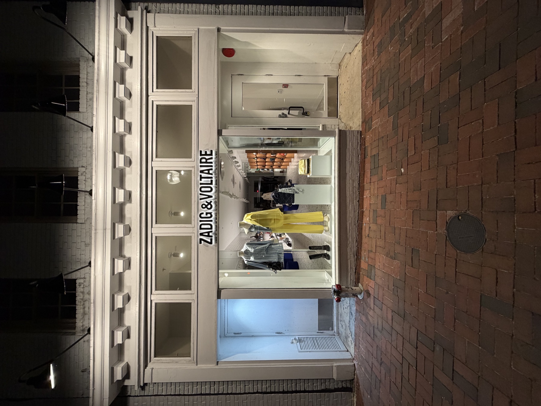 Halo-lit dimensional letters glowing on a storefront at night