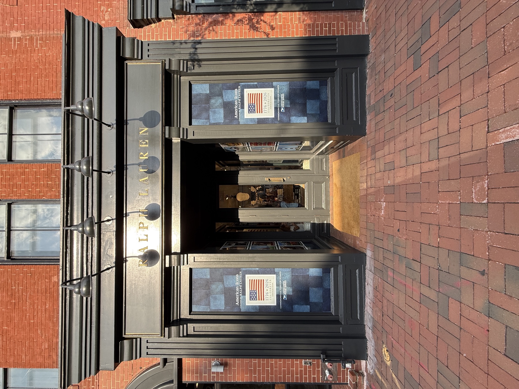 Entrance door graphics installed for a retail campaign