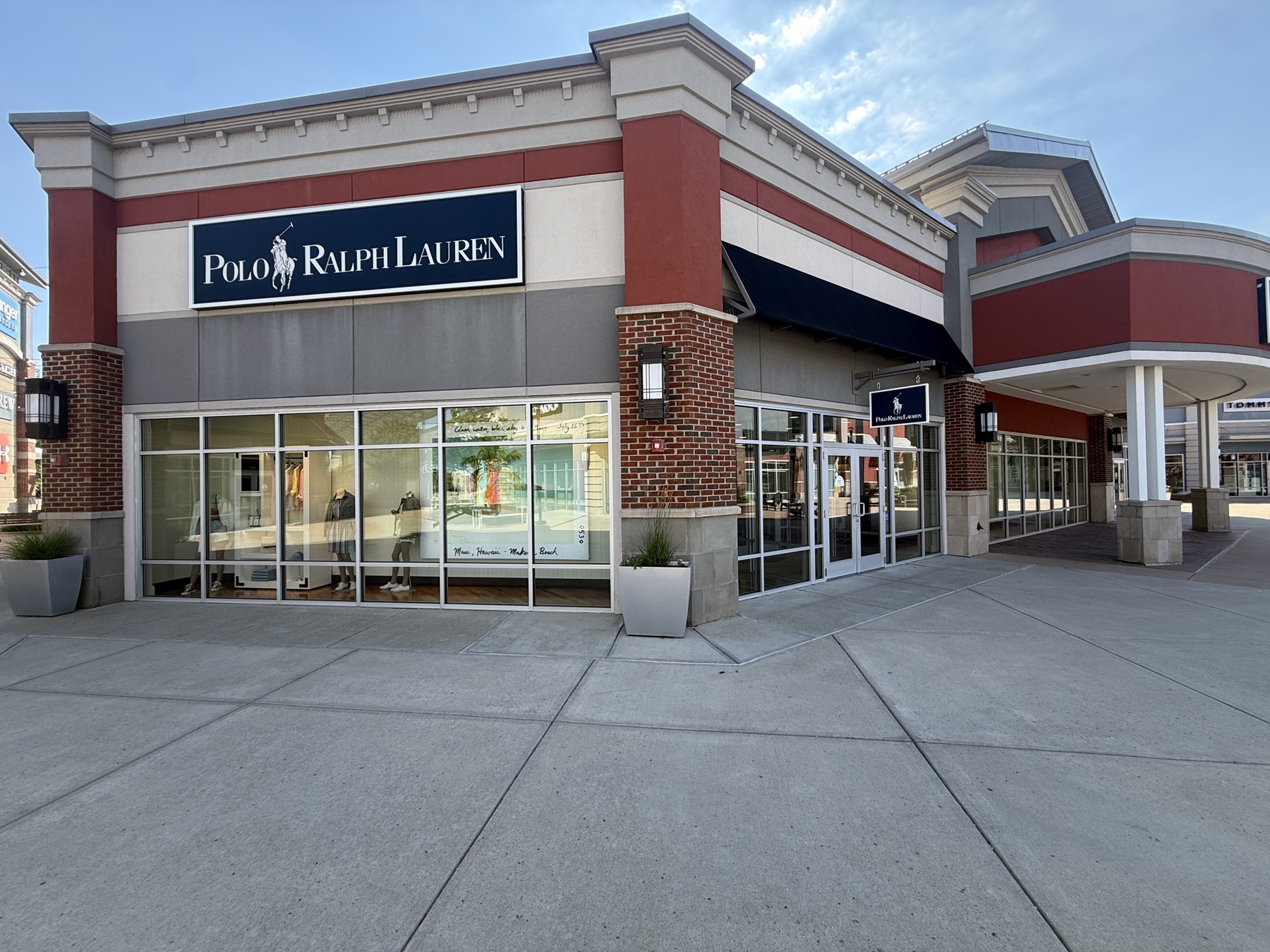 Channel letter signage installed on an outlet mall facade