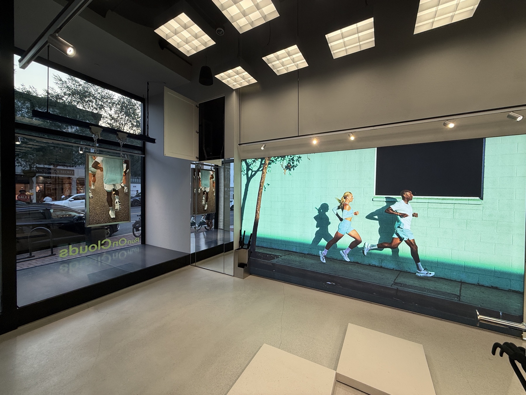 Interior retail lightbox and window graphics installation