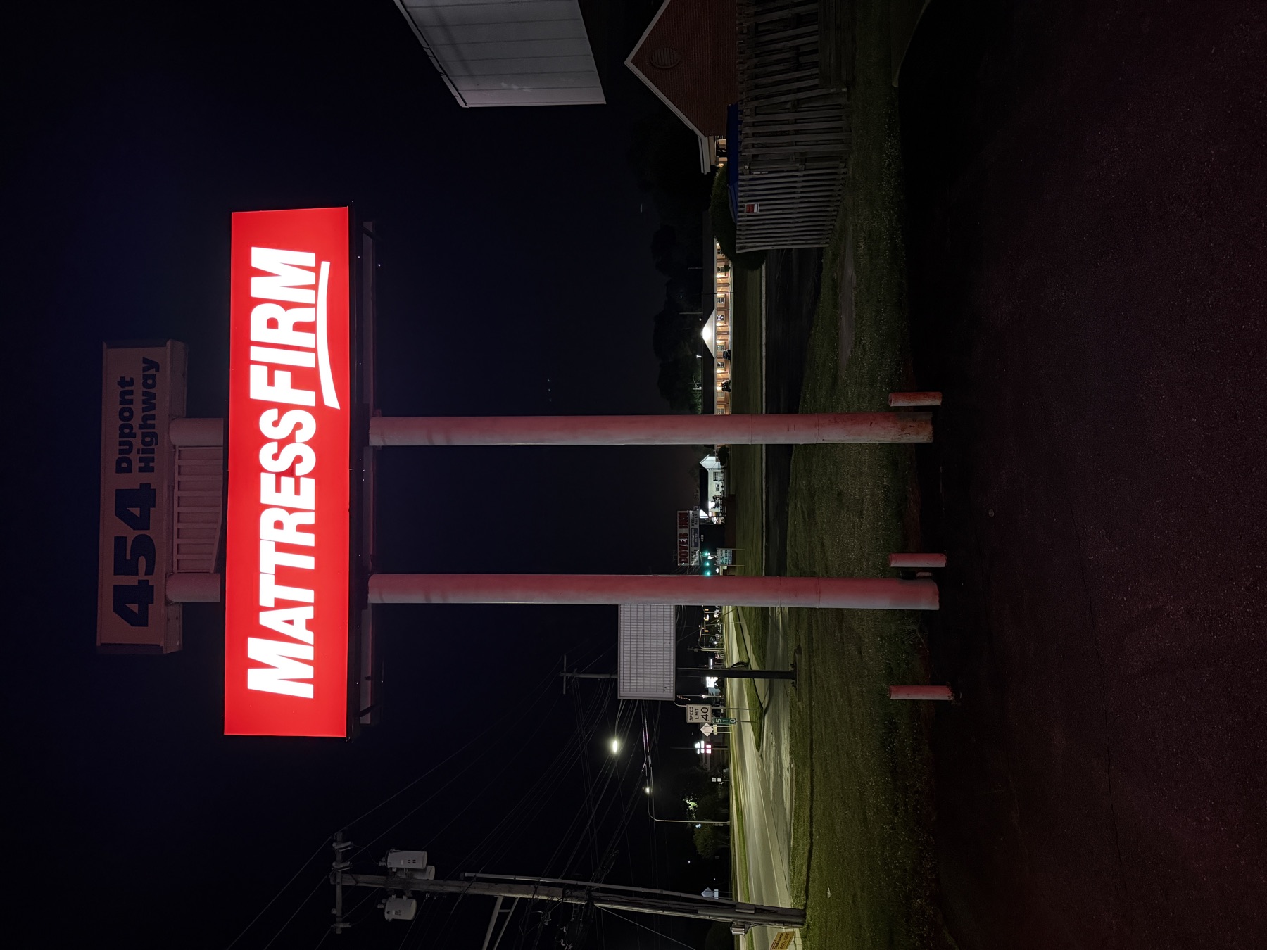 Illuminated sign panels at night after a service visit