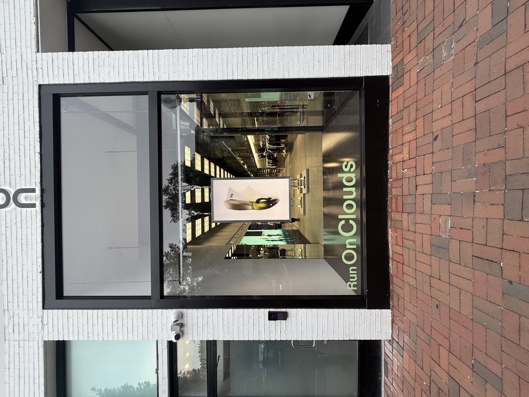 Printed window vinyl on a modern retail storefront