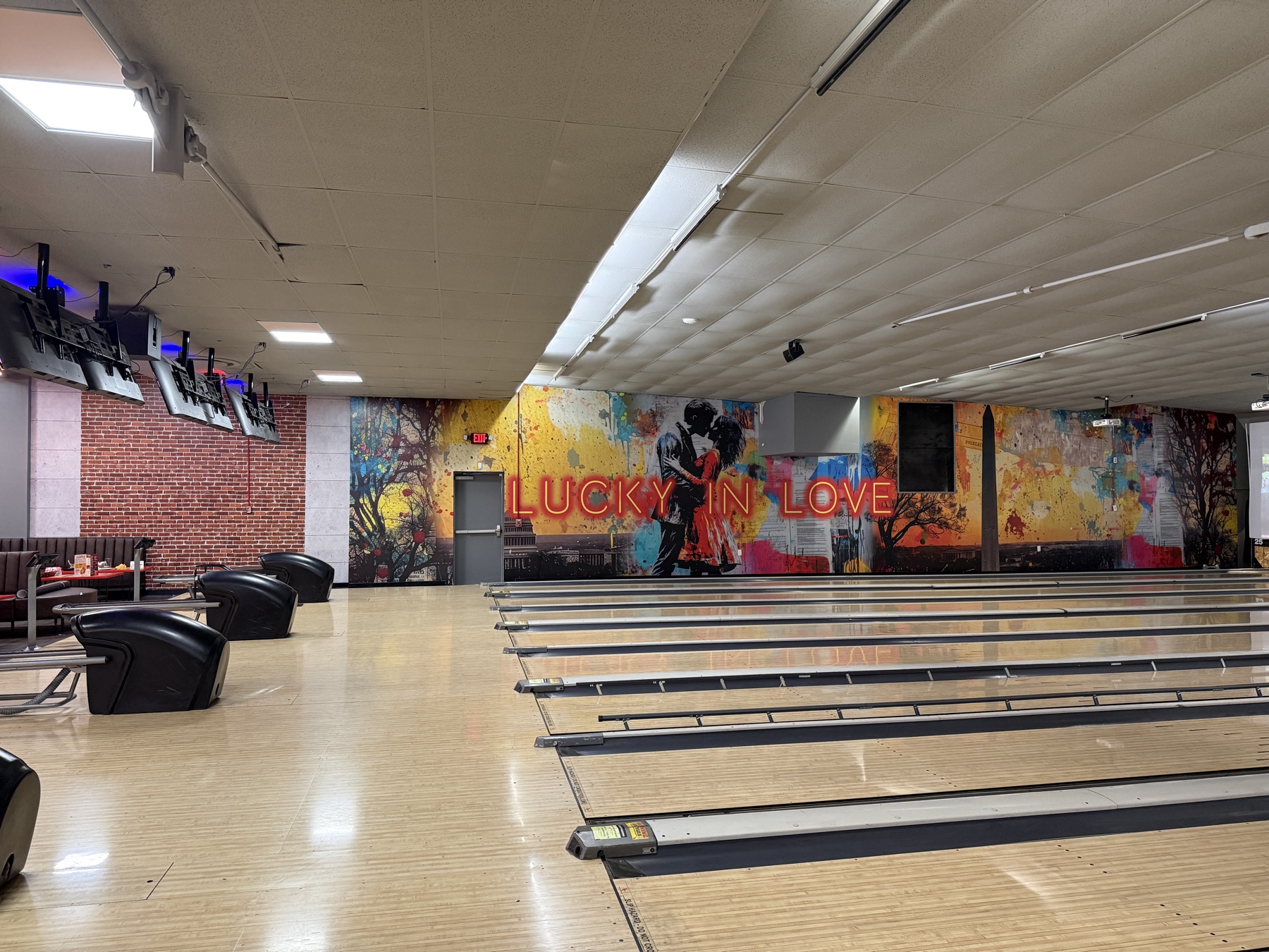 Large-format printed wall mural installed in an entertainment venue